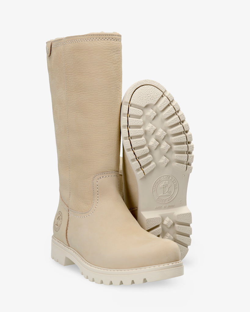 Bambina botas de piel con forro interior de pelo. crudo