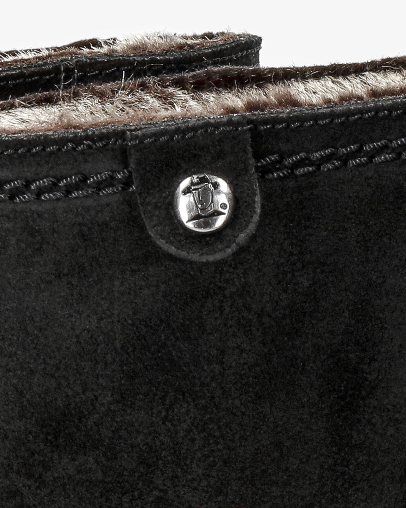 Bambina botas de piel con forro interior de pelo. negro