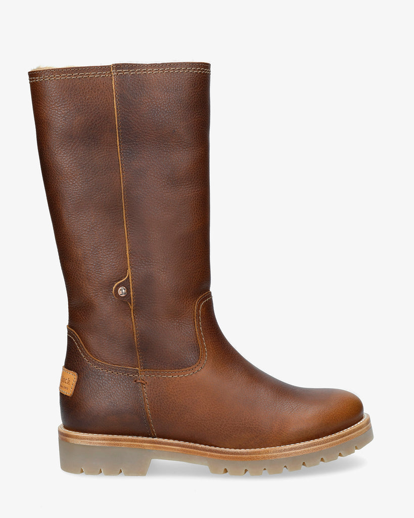 Bambina botas de piel con forro interior de pelo. cuero