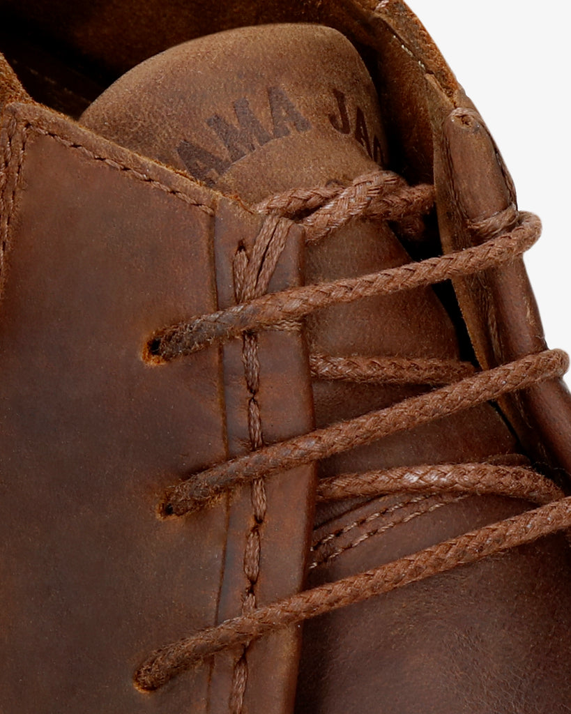 Beker botín de piel con forro interior de piel. cuero