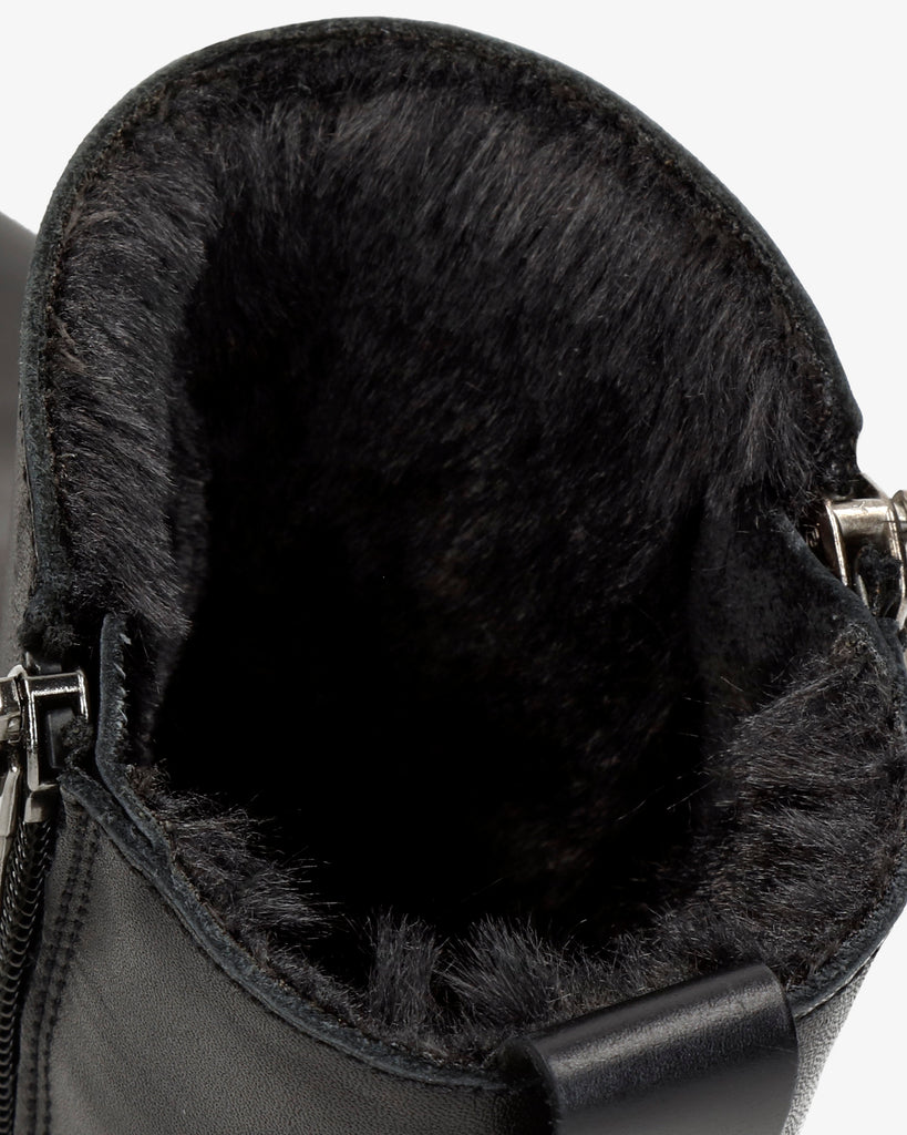 Fiore Trav botas de piel con forro interior de pelo. negro
