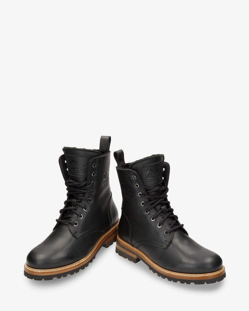 Frisia Igloo botas de piel con forro interior de pelo natural. negro