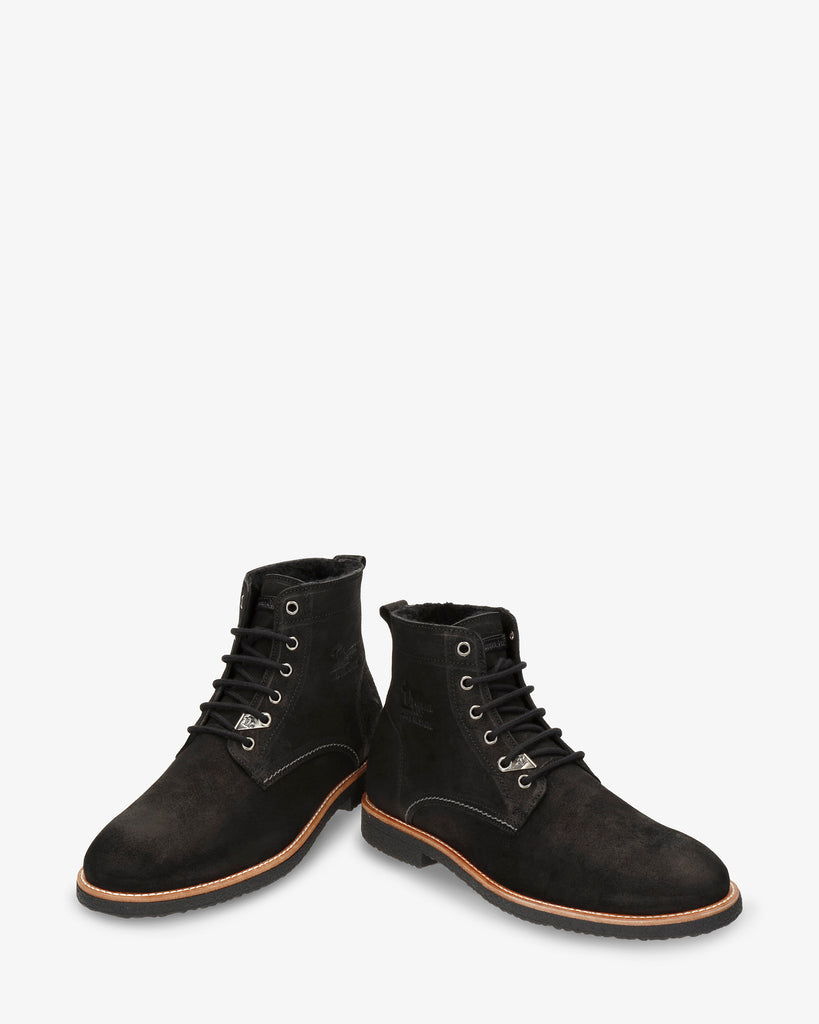 Glasgow Igloo botín de piel con forro interior de pelo natural. negro