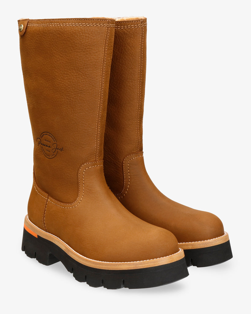 Lima botas de piel con forro interior de pelo. cuero