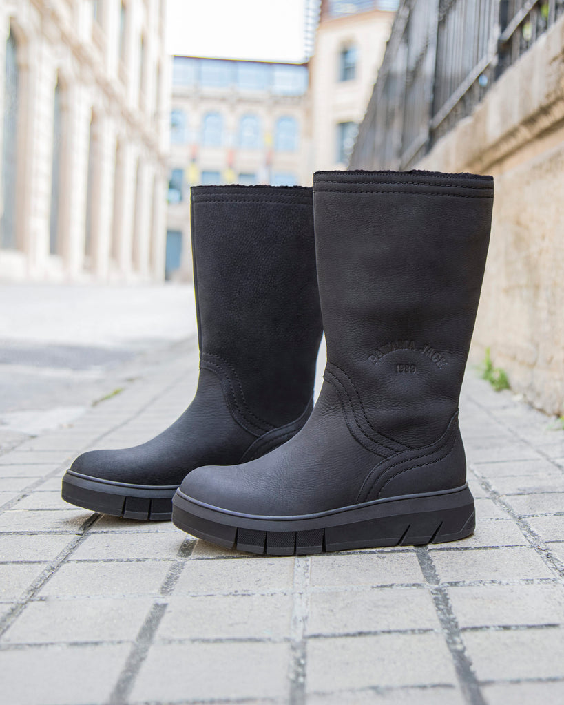 Neck botas de piel con forro interior de pelo. negro