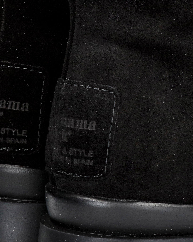 Phuket botín de piel con forro interior de pelo. negro