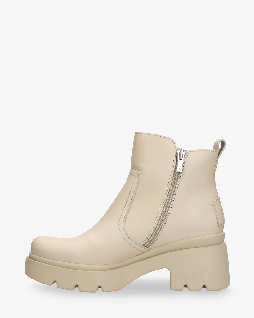 Phuket botín de piel con forro interior de pelo. crudo