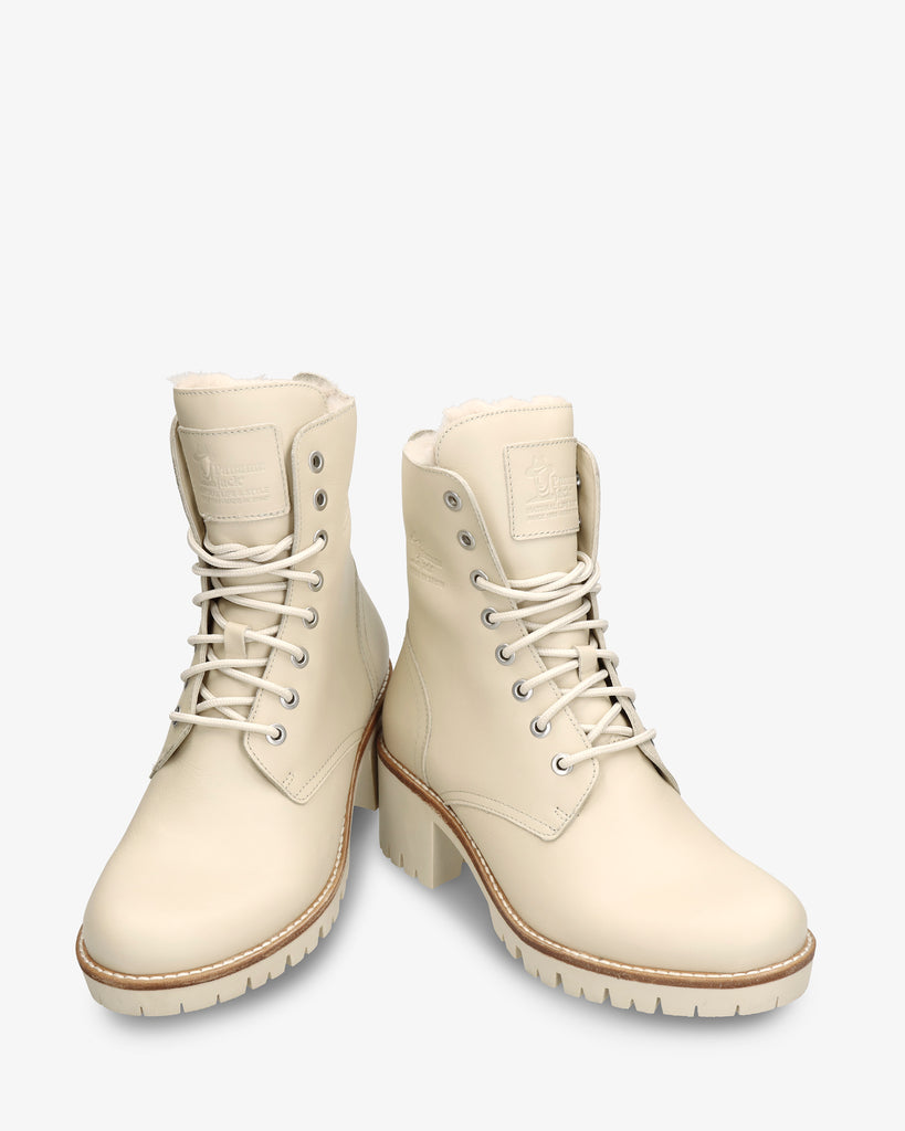 Polonia botas de piel con forro interior de pelo. crudo